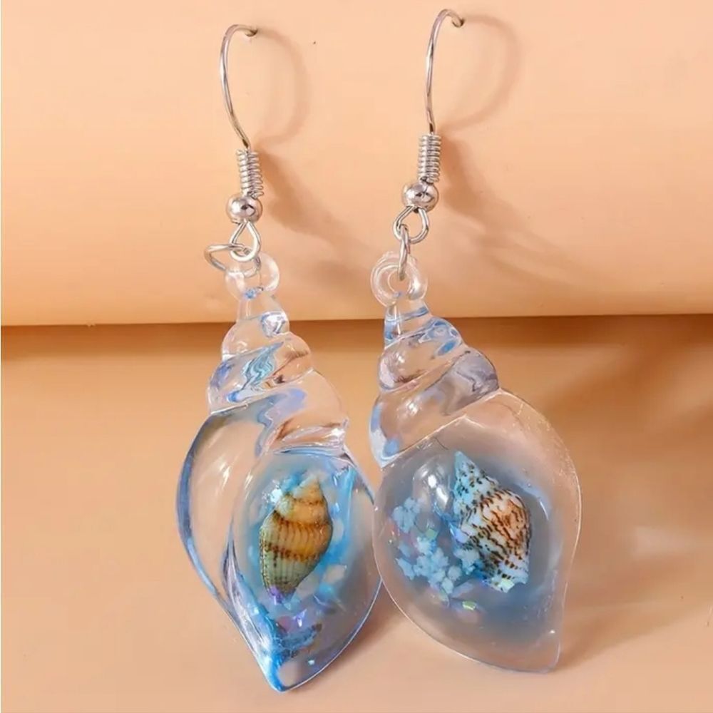 Hand crafted glowing seashell dangle earrings